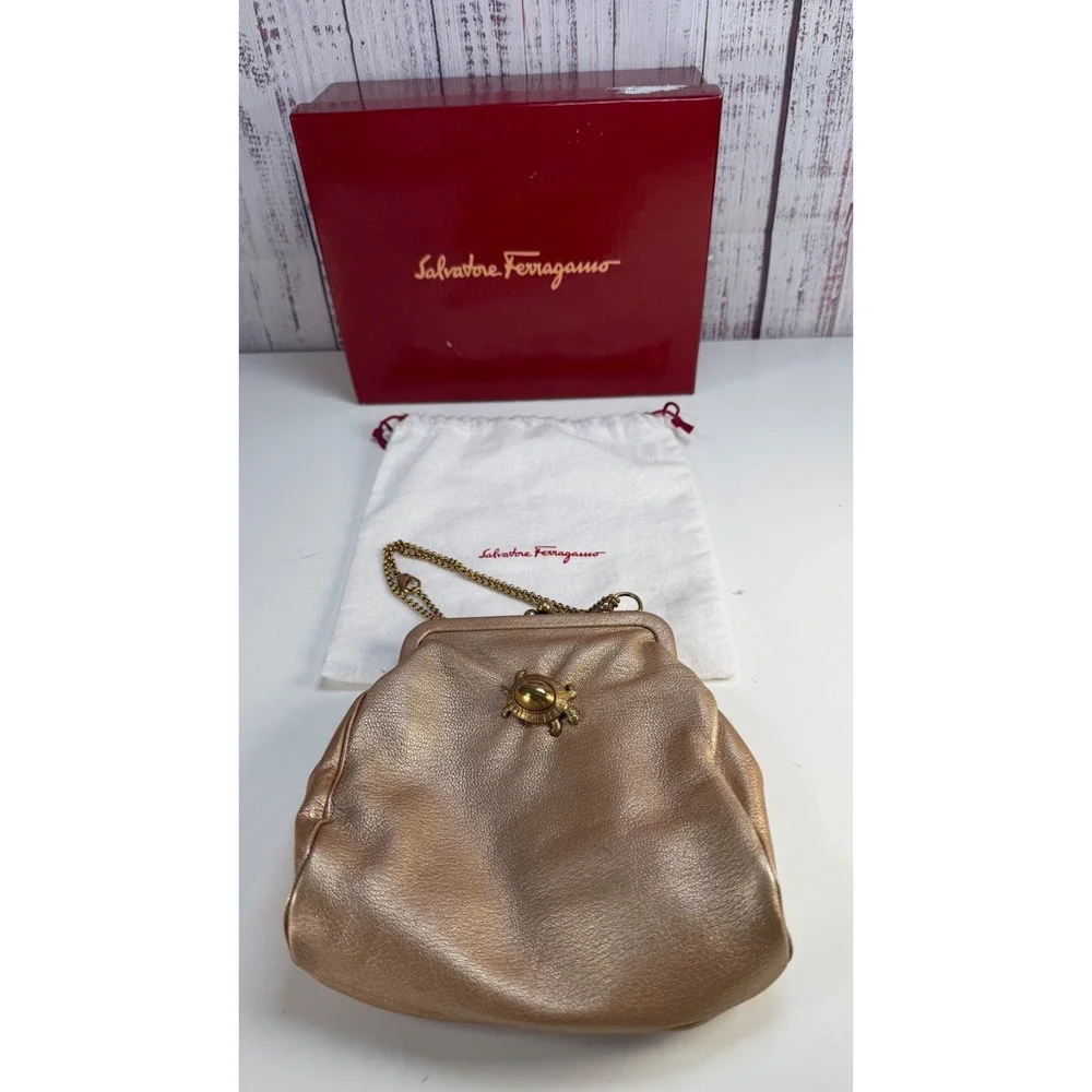 Auth Salvatore Ferragamo Gold Turtle clasp Metallic leather clutch w/dustbag